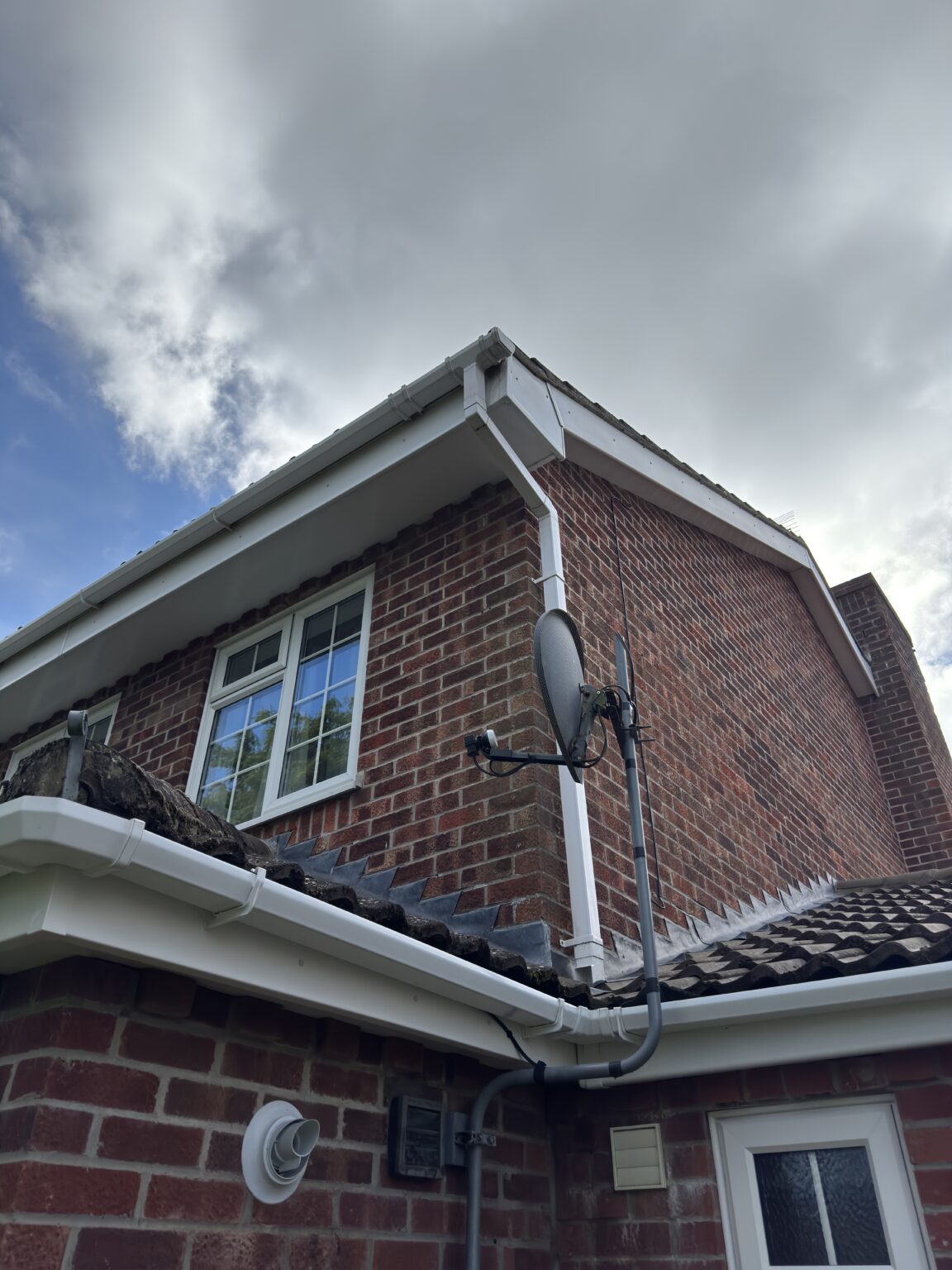 Gleaming white uPVC fascias, soffits and guttering after a soft wash